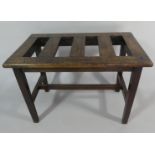 An Early 20th Century Mahogany Luggage Stand with an Open Slatted Top Supported on Square Tapering
