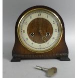 An Oak Cased Mantel Clock 22cms Wide