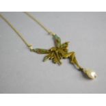 A 14ct Gold Pendant in the Form of an Angel with Coloured Plique a Jour Translucent Wings Baroque
