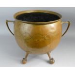 An Arts and Crafts Beaten Brass Globular Coal Bucket/Jardiniere with Stylised Handles and on Four