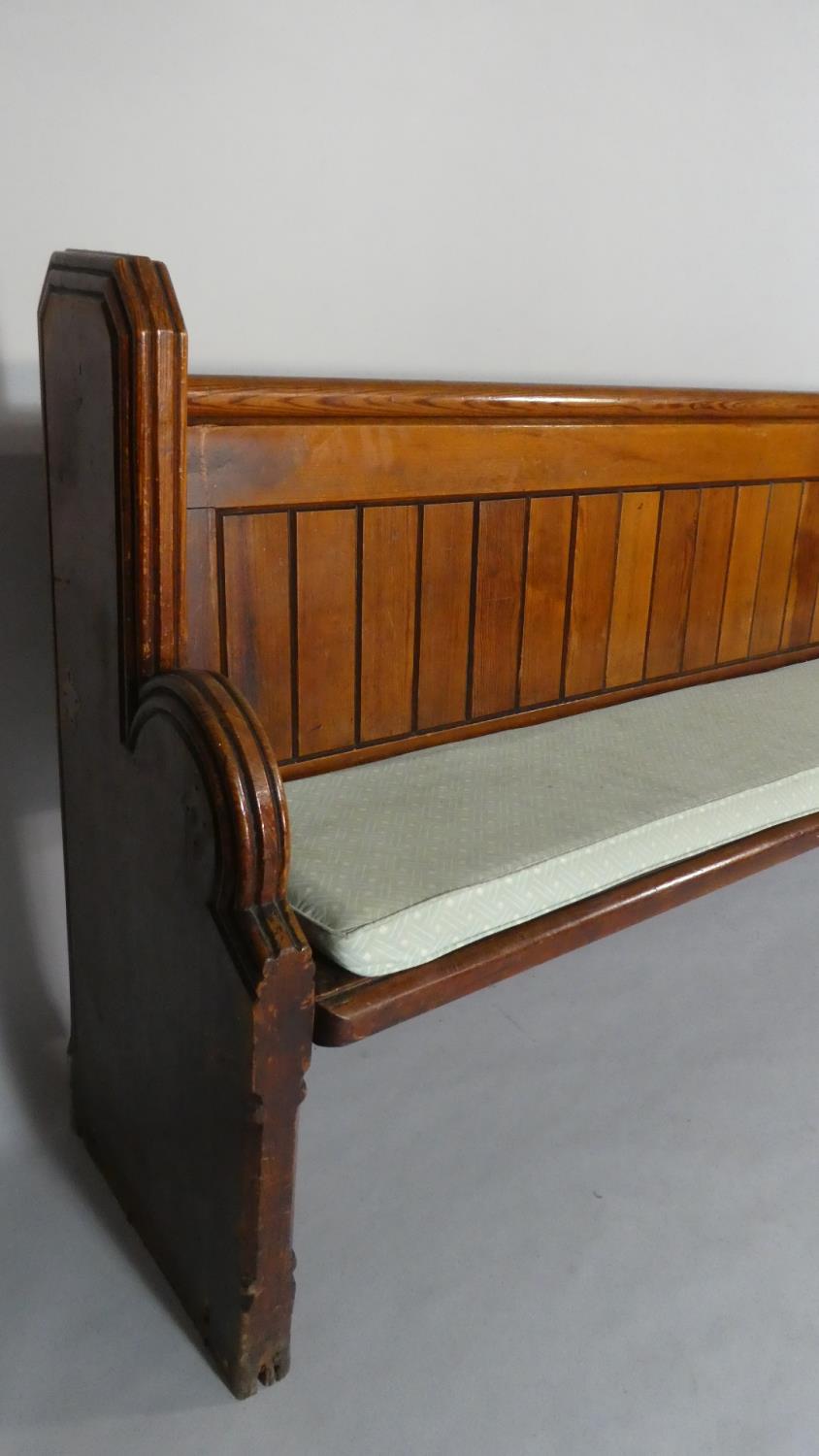 A Late Victorian Pitch Pine Pew with Foam Cushion Pad. 203cms Long - Image 3 of 3