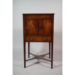 A 19th Century Mahogany Gentlemans Washstand with Pierced Top over Cupboard and Base Drawer Under