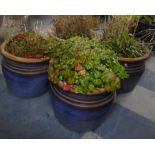 A Set of Four Blue Glazed Patio Planters. 40cms Diameter, 30cms High