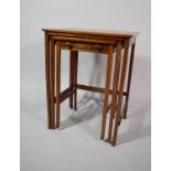 A 19th Century String Inlaid Mahogany Nest of Three Tables. The Smallest Having Drawer. 51x38x64cms