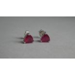 A Pair of Fancy Cut Ruby Stud Earrings mounted in 9ct Gold (Stamped 375) Each Stud Approx 5mm