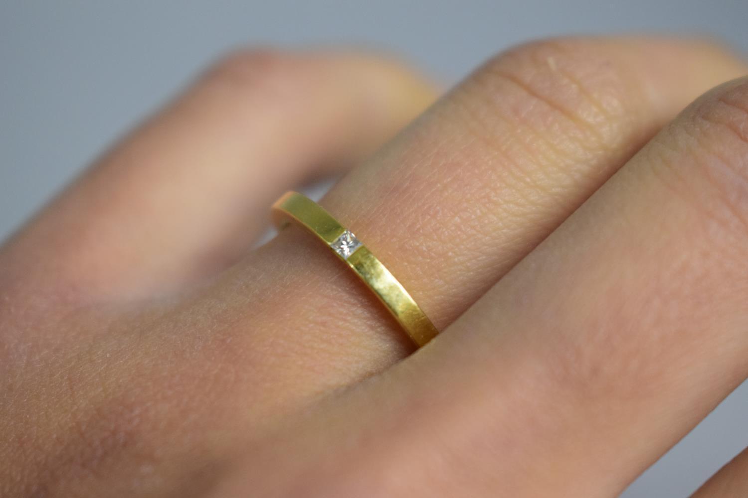 A Contemporary 18ct Gold and Diamond Solitaire Ring, The Small Square Diamond Flush Set on the Band. - Image 2 of 2