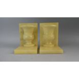A Pair of Modern Onyx Book Ends with Half Vase Mounts, 17cm hgh