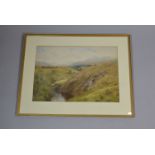 A Framed Watercolour of Welsh River Valley, Monogrammed For W. Eyre Walker. 45.5cm x 31.5cms