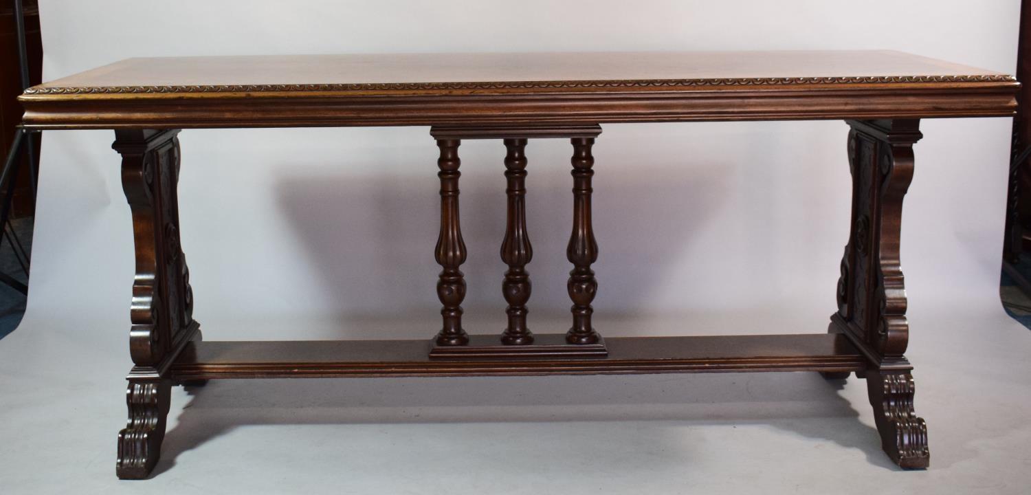 A Reproduction Regency Mahogany Library Table with Carved Border and Central Tri Spindle Vase