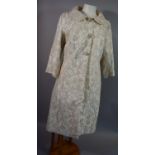 A Heavily Embroidered and Beaded Ivory 3/4 Length Coat by Mischevani, Size 12
