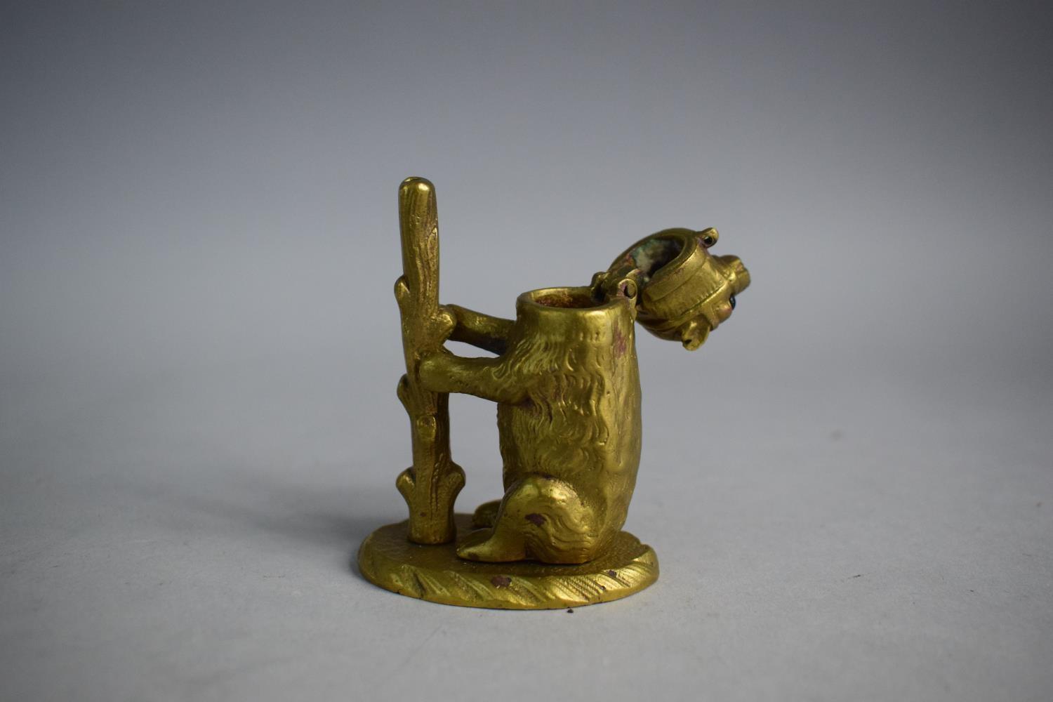 A Late 19th Century/Early 20th Novelty Night Light in the Form of a Bear with Hinged Head. 7.5cm - Image 3 of 5