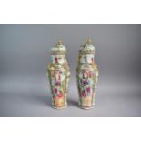 A Pair of Cantonese Export Famille Rose Lidded Vases, AF, 30cms high