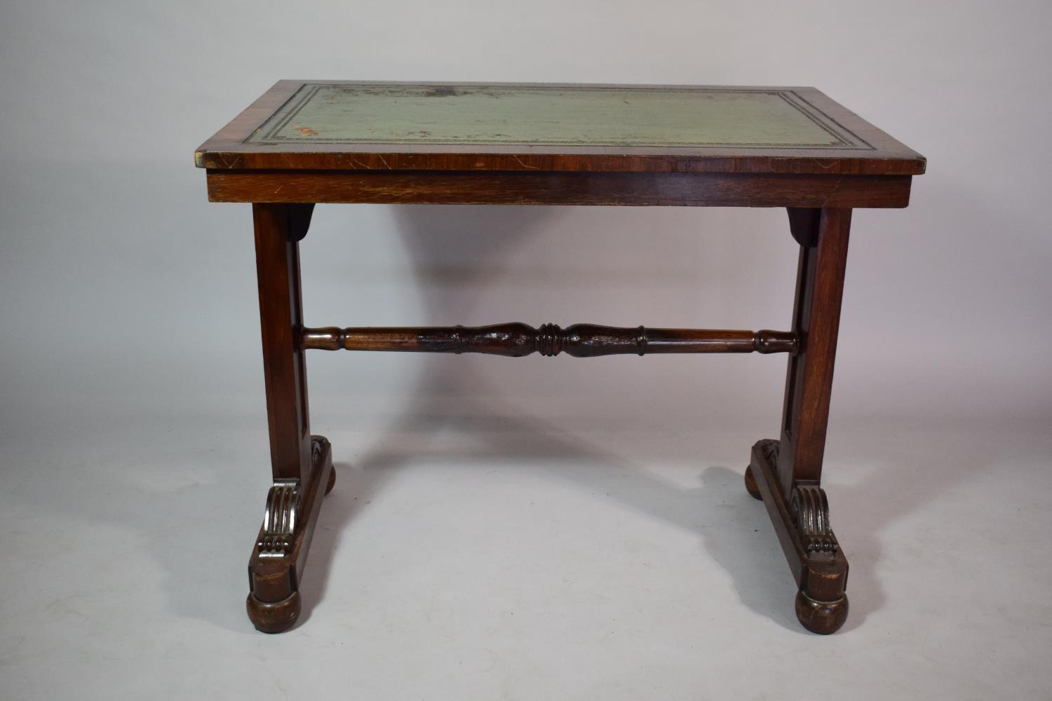 A Regency Rosewood Library Table with Tooled Leather Top. 91x60x74cms