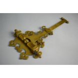 A Victorian Brass Range Crane with Hinged Boom. 28cms Long