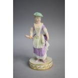 A Meissen Porcelain Figure of Maiden with Bonnet Holding Mirror, 16cms High