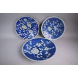 A Collection of Three Chinese Blue and White Glazed Stoneware Chargers with Prunus Pattern. 35cms,