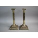 A Pair of Silver Plated Corinthian Column Candlesticks on Square Stepped Bases, 29.5cm High