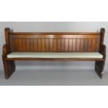 A Late Victorian Pitch Pine Pew with Foam Cushion Pad. 203cms Long
