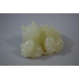 An Oriental Carved Jade Study of a Cat and Two Kittens, 5.2cms Long