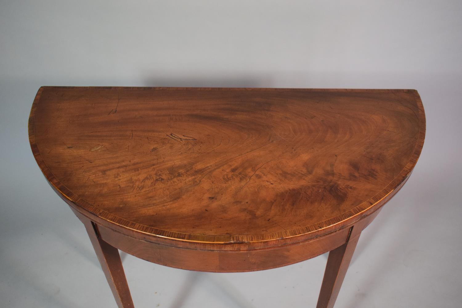 A Mahogany String Inlaid Georgian Games Table with Beize Top and Supported on Tapered Legs. 84cms - Image 5 of 5