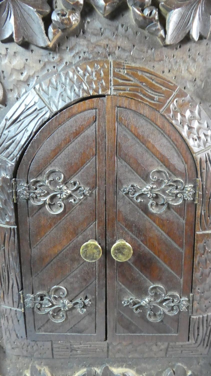 A 19th Century Black Forest Carved Linden Wood Table Cabinet. 40cm x 19cm x 59cm High - Image 4 of 6