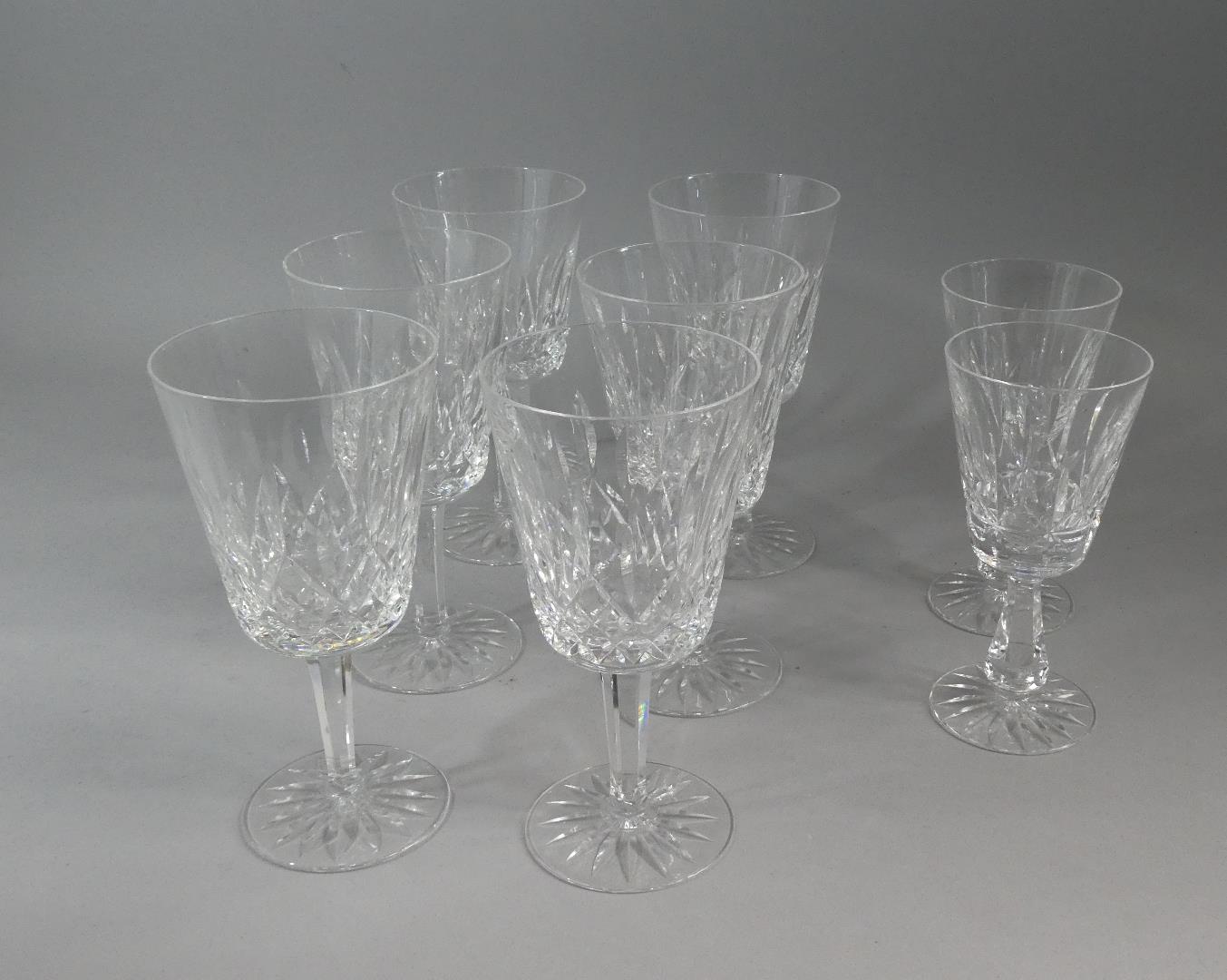 A Set of Six Cut Glass Wines and Two Similar Examples