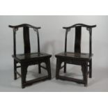 A Pair of 19th Century Ebonised Chinese Scholar's Chairs of Ming Design.