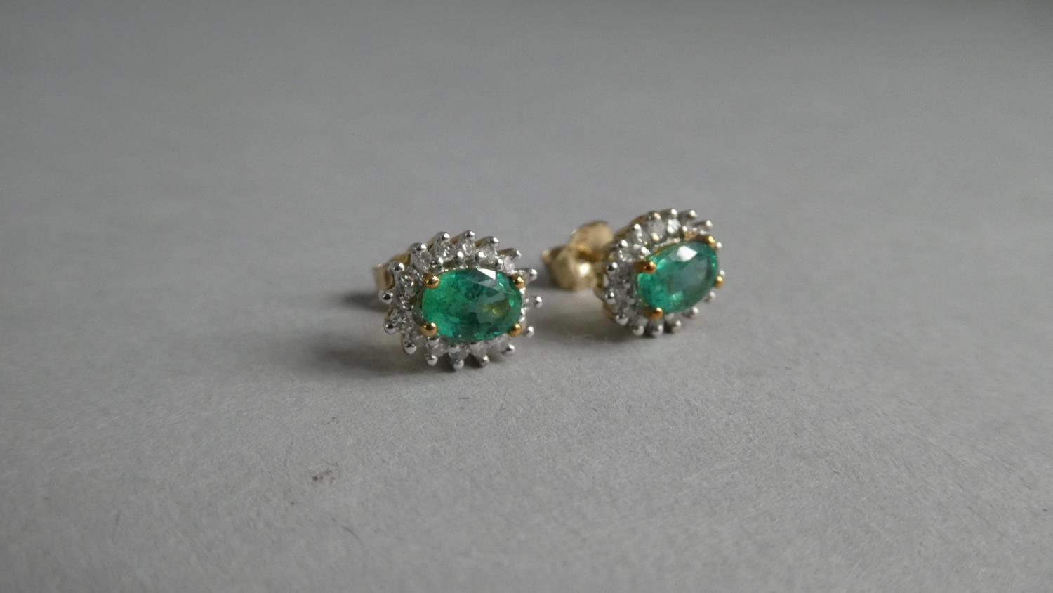 A Pair of Emerald and Diamond Stud Earrings. Cushion Cut Emeralds 6mmx4mm. - Image 2 of 2