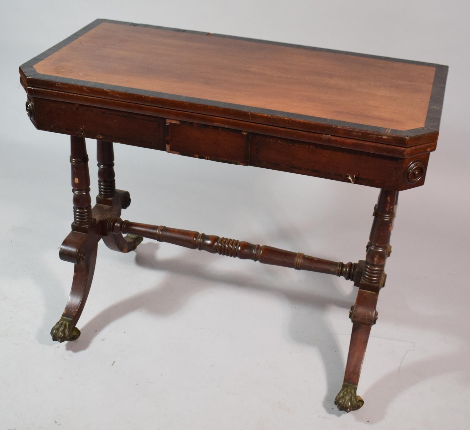 A Mid/Late 19th Century Mahogany Lift and Twist Games Table with Claw Feet and Castors. 89cms Wide - Image 2 of 3