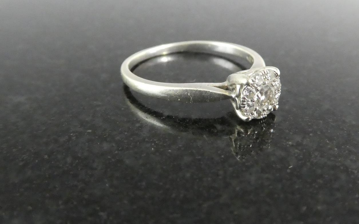 A Contemporary 9ct Gold and Diamond Cluster Ring, Eight Small Diamonds in Halo Mount Around Centre