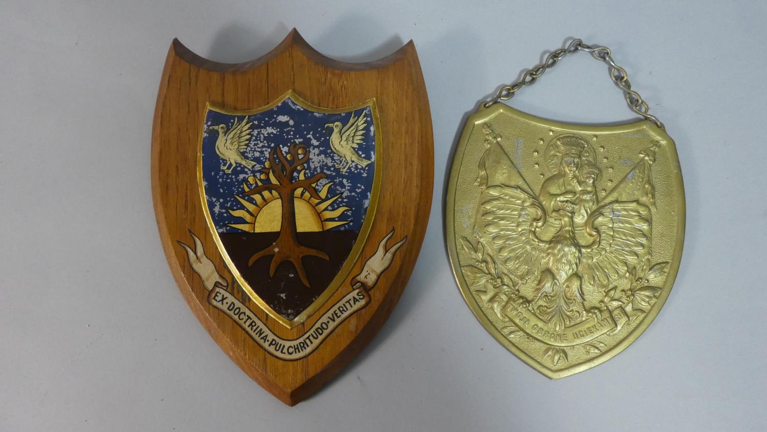 A Vintage School Crest on Shield Plinth, Together with a Polish Brass Example