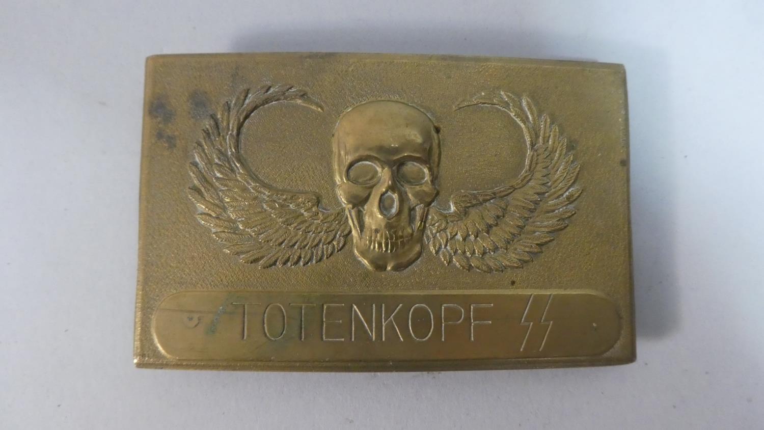 A Reproduction Nazi Brass Belt Buckle Inscribed Totemkopf SS (3rd Panzer Division), 9cm Wide