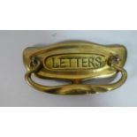 An Art Nouveau Brass Door Knocker and Letter Flap, 20cm Wide