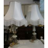 A Pair of Brass and Onyx Table Lamps and Shades