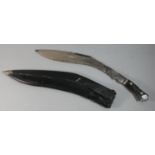 A Large Ornamental Kukri Knife in Scabbard, Missing Spare Daggers