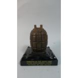 A Desk Top Novelty Inkwell and Pen Rest in the form of a grenade, "Memento of the Great War,