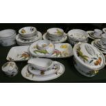 A Collection of Royal Worcester Evesham Dinnerwares to Include Dinner Plates, Bowls, Lidded