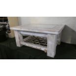 A Limed Pine Rectangular Bijouterie Coffee Table Containing Pebbles, 83cm Wide