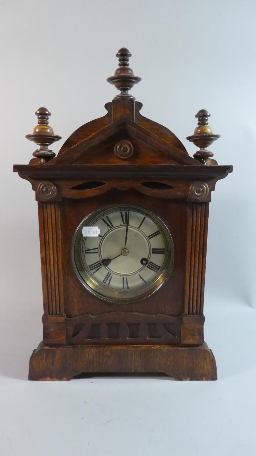 An Edwardian Oak American Mantle Clock of Architectural Form, 45cm high