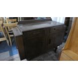 An Edwardian Oak Two Drawer Sideboard, 135cm Wide