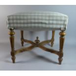 A Mahogany Framed Square Topped Upholstered Stool with Tapering Reeded Supports and Cross Stretcher,