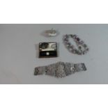 A Box Containing Costume, Silver Plated Belt, Chromed Tape Measure, Brooch etc