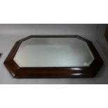 An Edwardian Mahogany Cushioned Framed Wall Mirror, 78cm High