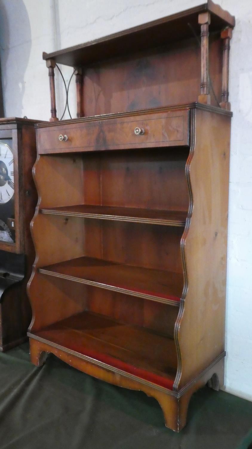 A Reproduction Waterfall Bookcase with Galleried Top, Single Long Drawer, Three Shelves Under,