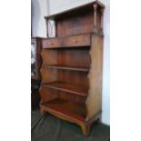A Reproduction Waterfall Bookcase with Galleried Top, Single Long Drawer, Three Shelves Under,