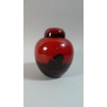 A Royal Doulton Flambe Woodcut Pattern Ginger Jar and Cover, 12.5cm High