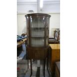 An Edwardian Inlaid Mahogany Bow Fronted Double Freestanding Cabinet with Glaze Top Section and