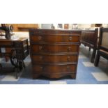 A Mid 20th Century Serpentine Front Mahogany Chest of Four Long Drawers with Brushing Slide Over,