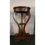 A Reproduction Mahogany Circular Jardiniere Stand on Triform Base with Scrolled Support, 80cm High