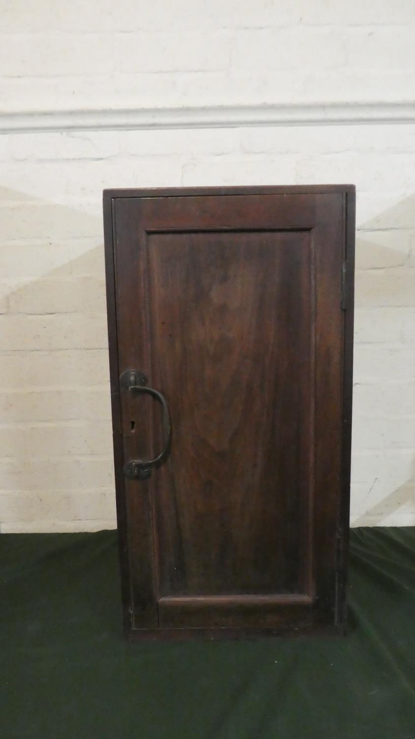 A Mahogany Cabinet with Panelled Door, 65.5cm High